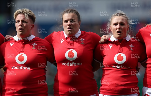 210424 - Wales v France, Guinness Women’s 6 Nations - Donna Rose of Wales, Carys Phillips of Wales and Alex Callender of Wales line up for the anthems