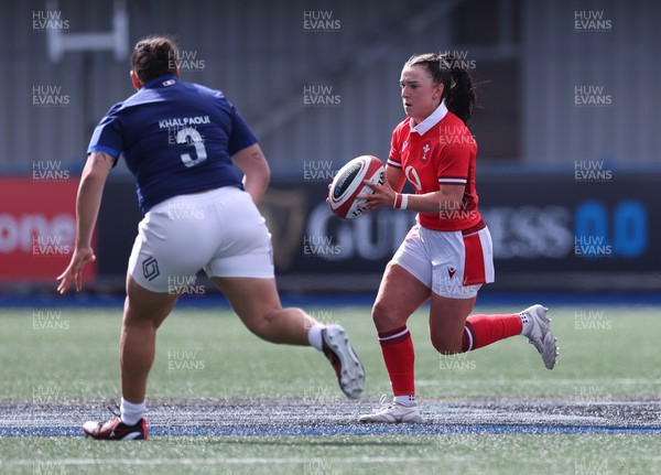 210424 - Wales v France, Guinness Women’s 6 Nations - Sian Jones of Wales takes on Assia Khalfaoui of France