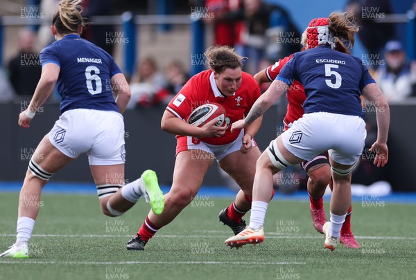 210424 - Wales v France, Guinness Women’s 6 Nations - Gwenllian Pyrs of Wales takes on Charlotte Escudero of France