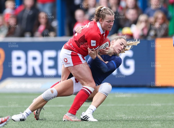 210424 - Wales v France, Guinness Women’s 6 Nations - Carys Cox of Wales takes on Joanna Grisez of France