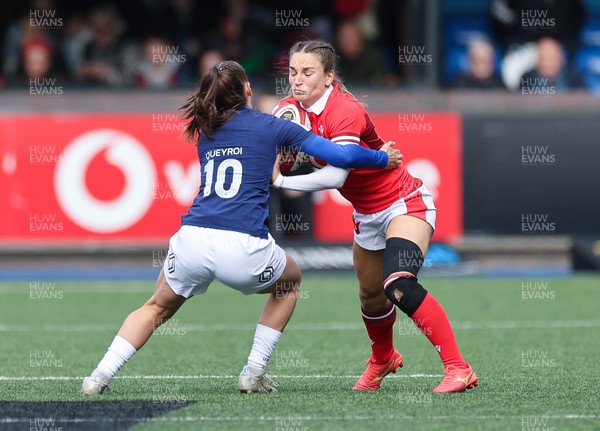 210424 - Wales v France, Guinness Women’s 6 Nations - Jasmine Joyce of Wales takes on Lina Queyroi of France
