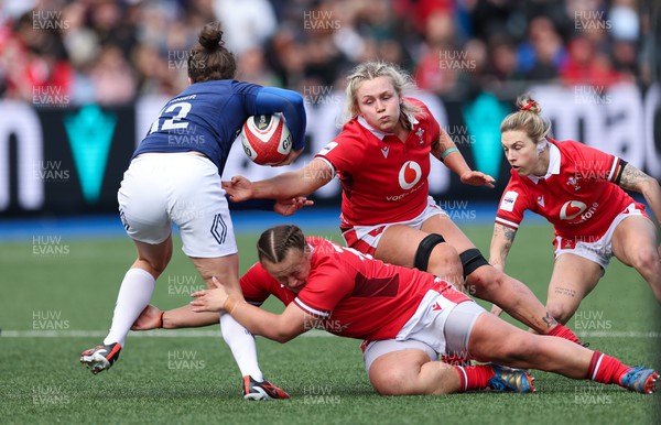 210424 - Wales v France, Guinness Women’s 6 Nations - Gabrielle Vernier of France is challenged by Lleucu George of Wales, Alex Callender of Wales and Keira Bevan of Wales