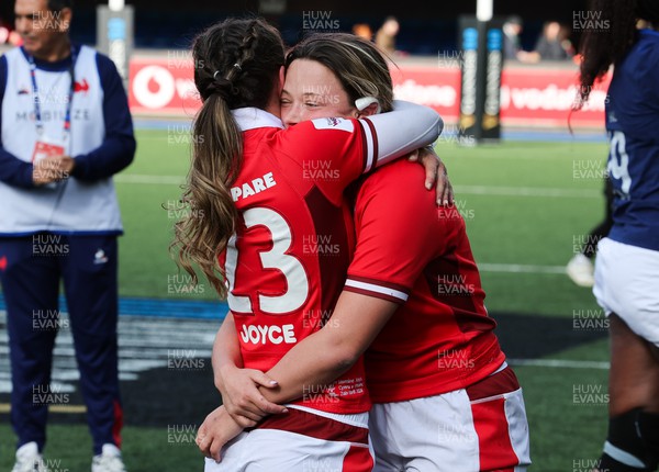 210424 - Wales v France, Guinness Women’s 6 Nations - Jasmine Joyce of Wales and Alisha Butchers of Wales at the end of the match