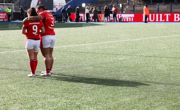 210424 - Wales v France, Guinness Women’s 6 Nations - Sian Jones of Wales and Sisilia Tuipulotu of Wales embrace each other at the end of the match