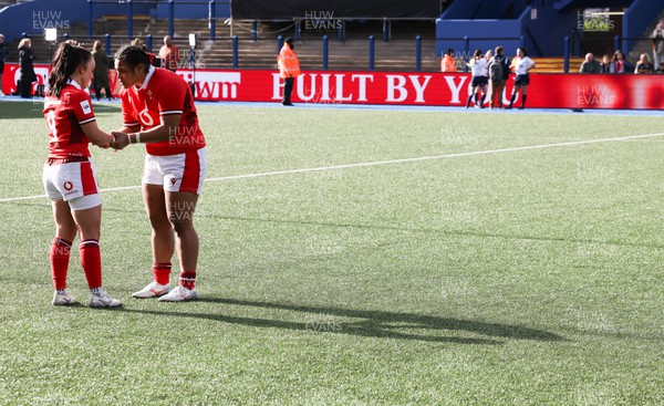 210424 - Wales v France, Guinness Women’s 6 Nations - Sian Jones of Wales and Sisilia Tuipulotu of Wales embrace each other at the end of the match