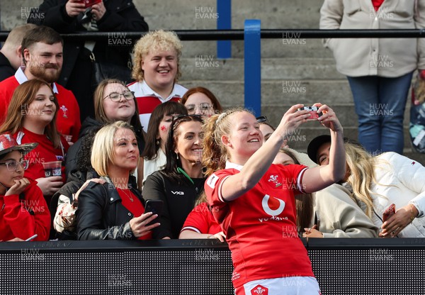 210424 - Wales v France, Guinness Women’s 6 Nations - Carys Cox of Wales with Wales fans at the end of the match