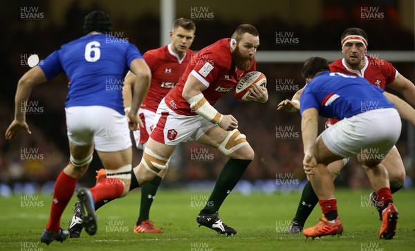 220220 - Wales v France - Guinness 6 Nations - Jake Ball of Wales is tackled by Julien Marchand of France
