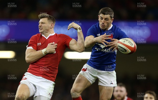 220220 - Wales v France - Guinness 6 Nations - Dan Biggar of Wales and Anthony Bouthier of France go up for the ball