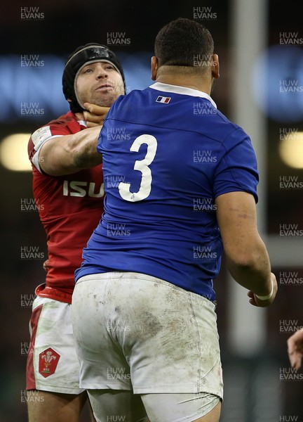 220220 - Wales v France - Guinness 6 Nations - Mohamed Haouas of France grabs Leigh Halfpenny of Wales by the throat after the final whistle went