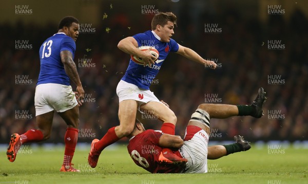 220220 - Wales v France, Guinness Six Nations Championship 2020 - Antoine Dupont of France is tackled by Taulupe Faletau of Wales