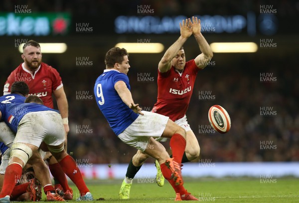 220220 - Wales v France, Guinness Six Nations Championship 2020 - Gareth Davies of Wales looks to charge down the kick from Antoine Dupont of France