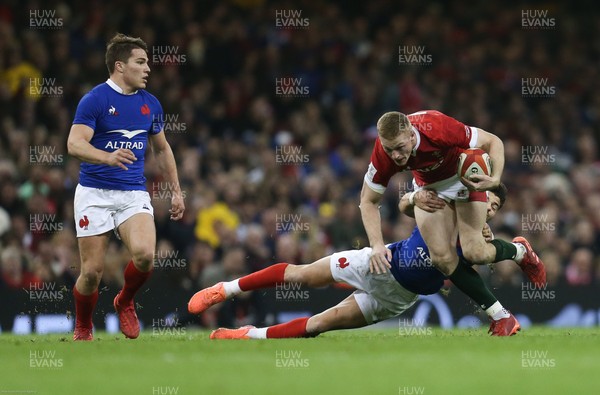 220220 - Wales v France, Guinness Six Nations Championship 2020 - Johnny McNicholl of Wales is tackled by Romain Ntamack of France