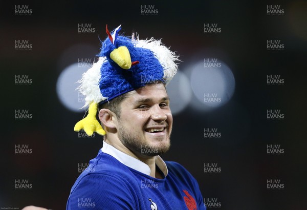 220220 - Wales v France, Guinness Six Nations Championship 2020 - Julien Marchand of France dons a French cockerel hat as the team celebrates the win over Wales