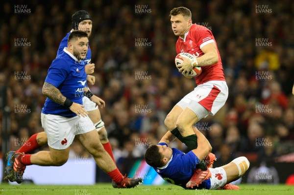 220220 - Wales v France - Guinness Six Nations - Dan Biggar of Wales  is tackled by Arthur Vincent of France  