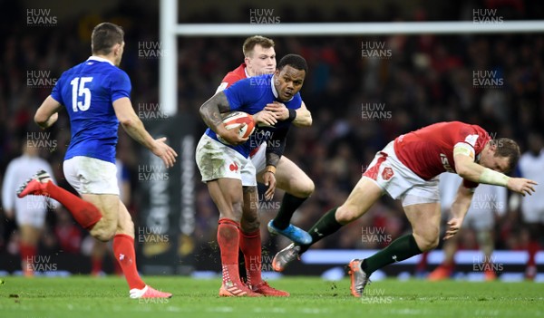 220220 - Wales v France - Guinness Six Nations - Virimi Vakatawa of France is tackled by Nick Tompkins of Wales