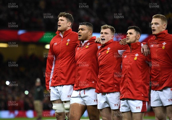 220220 - Wales v France - Guinness Six Nations - Will Rowlands, Leon Brown, Nick Tompkins, Tomos Williams and Johnny McNicholl during the anthems