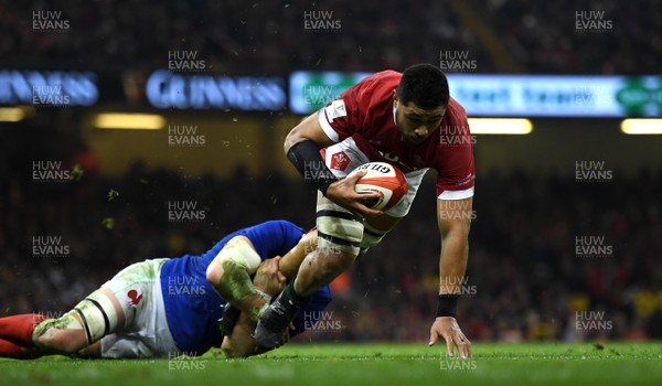 220220 - Wales v France - Guinness Six Nations - Taulupe Faletau of Wales is tackled by Bernard Le Roux of France 