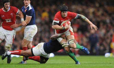 26.02.10 - Wales v France - RBS Six Nations 2010 - Ryan Jones of Wales takes on Mathieu Bastareaud of France. 