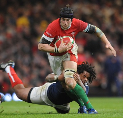 26.02.10 - Wales v France - RBS Six Nations 2010 - Ryan Jones of Wales takes on Mathieu Bastareaud of France. 