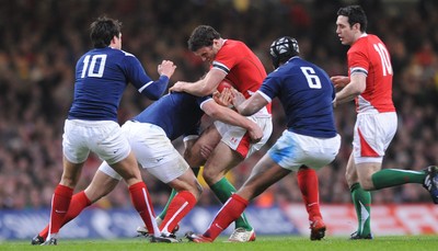 26.02.10 - Wales v France - RBS Six Nations 2010 - Jamie Roberts of Wales is tackled by Yannick Jauzion of France. 