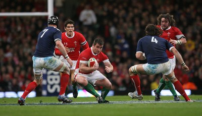 26.02.10 Wales v France... Wales' Huw Bennett tries to get past France's Lionel Nallet and  Julien Bonnaire. 