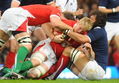26.02.10 - Six Nations Rugby, Wales v France Wales' Bradley Davies is brought down 