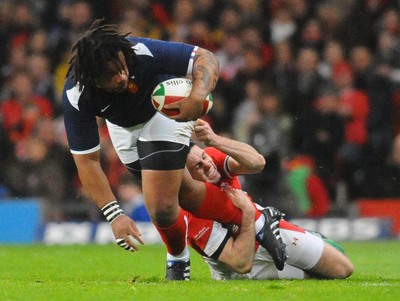 26.02.10 - Six Nations Rugby, Wales v France France's Mathieu Bastareaud is tackled by Wales' Stephen Jones 