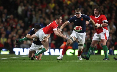 26.02.10 ... Wales v France, RBS 6 Nations 2010 -  Wales' Shane Williams makes the ball available as he's tackled   