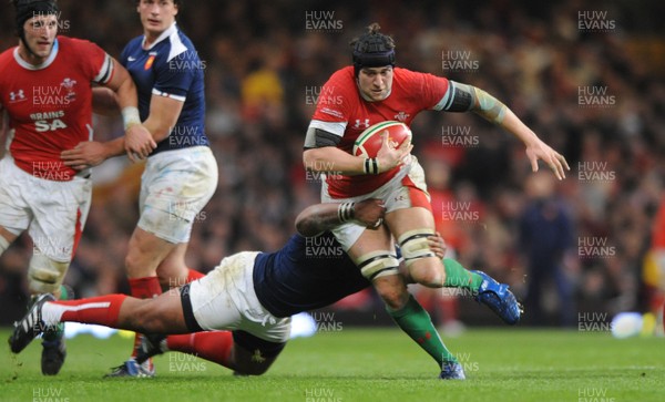 26.02.10 - Wales v France - RBS Six Nations 2010 - Ryan Jones of Wales takes on Mathieu Bastareaud of France. 