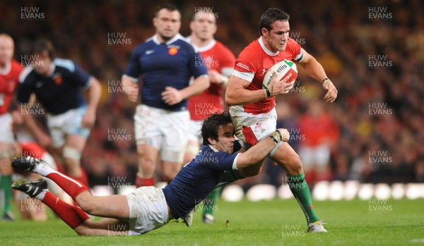 26.02.10 - Wales v France - RBS Six Nations 2010 - Lee Byrne of Wales is tackled by Morgan Parra of France. 