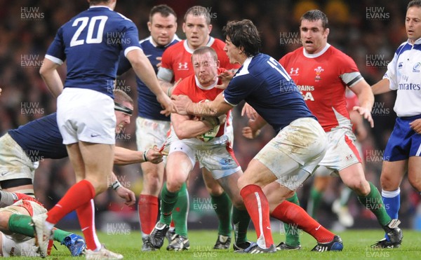 26.02.10 - Wales v France - RBS Six Nations 2010 - Richie Rees of Wales is tackled by Yannick Jauzion of France. 