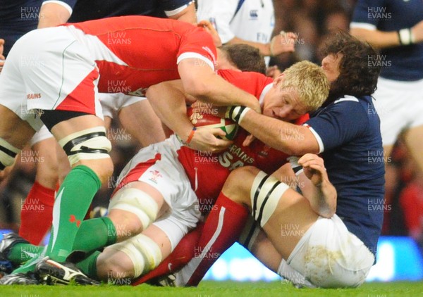 26.02.10 - Six Nations Rugby, Wales v France Wales' Bradley Davies is brought down 