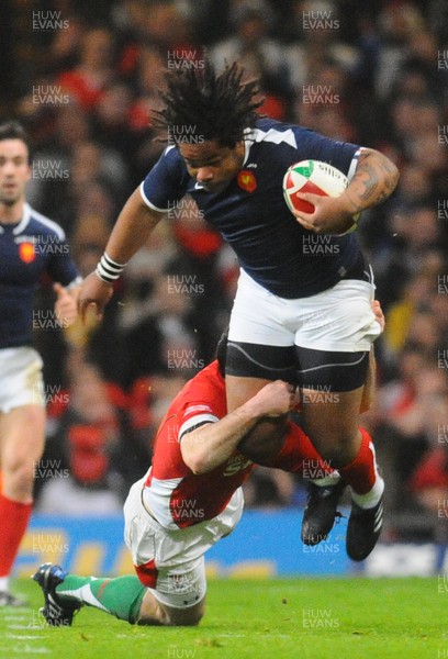26.02.10 - Six Nations Rugby, Wales v France France's Mathieu Bastareaud is tackled by Wales' Stephen Jones 