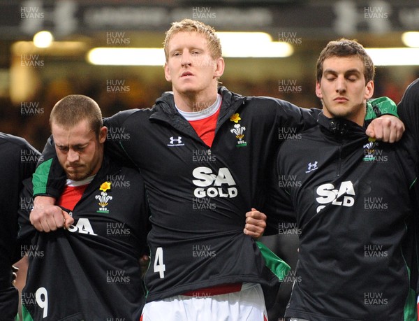 26.02.10 - Six Nations Rugby, Wales v France Wales' Bradley Davies (ctr) during a minutes silence in memory of his mother who died during the build up to this match  