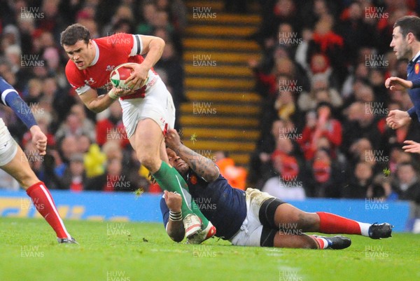 26.02.10 - Six Nations Rugby, Wales v France Wales' Jamie Roberts  is tackled by France's Mathieu Bastareaud  