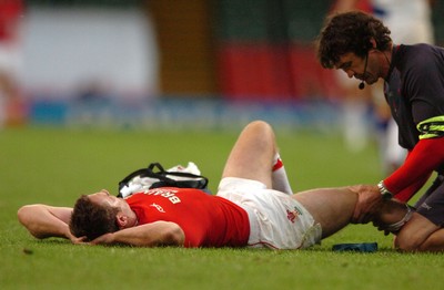 26.08.07 - Wales v France - Invesco Perpetual 2007 Summer Series - Wales' Kevin Morgan is treated by Mark Davies 