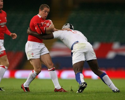 26.08.07  Wales v France Wales Shane Williams is tackled by Serge Betsen 