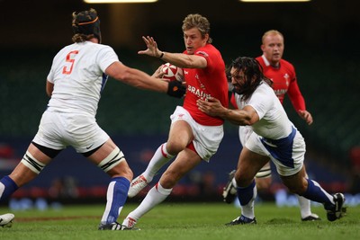 26.08.07 - Wales v France -  Wales' Jamie Robinson takes on France's Jerome Thion and Sebastien Chabal 