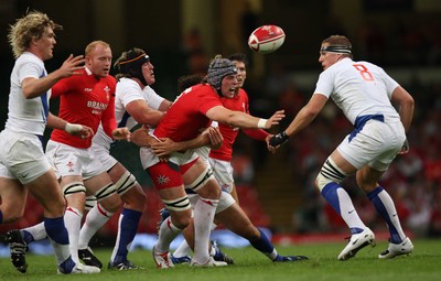 26.08.07 - Wales v France -  Wales' Alun-Wyn Jones loses possesion to France's Imanol Harinordoquy 