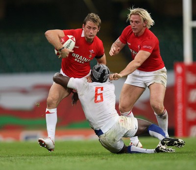 26.08.07 - Wales v France -  Wales' Jamie Robinson is tackloed by France's Serge Betsen 