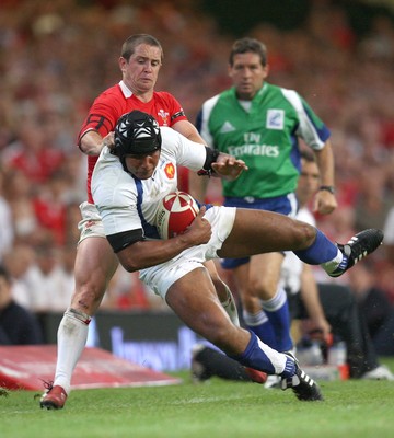 26.08.07 - Wales v France -  Wales' Shane Williams tackles France's Damien Traille 