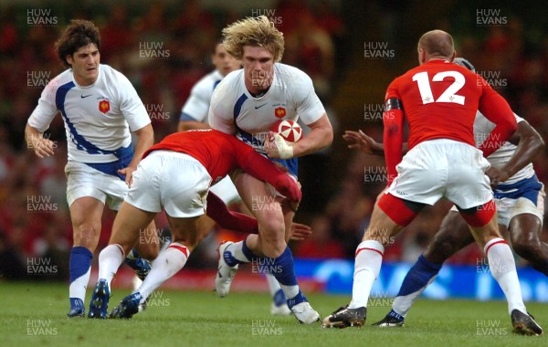 26.08.07 - Wales v France - Invesco Perpetual 2007 Summer Series - France's Remy Martin is tackled by James Hook 