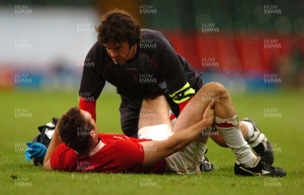 26.08.07 - Wales v France - Invesco Perpetual 2007 Summer Series - Wales' Kevin Morgan is treated by Mark Davies 