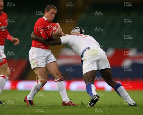 26.08.07  Wales v France Wales Shane Williams is tackled by Serge Betsen 