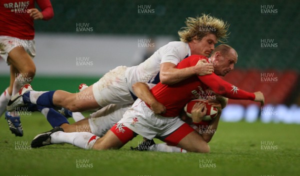 26.08.07  Wales v France... Wales Gareth Thomas is tackled by Remy Martin 
