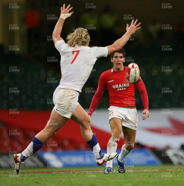 26.08.07  Wales v France... Wales James Hook kicks over Remy Martin 