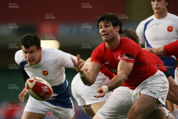 26.08.07  Wales v France... Wales' Mike Phillips releases the backs. 
