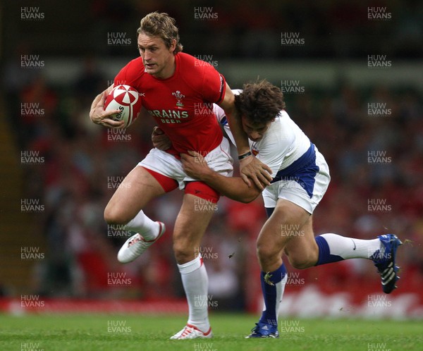 26.08.07 - Wales v France -  Wales' Jamie Robinson is tackled by France's Yannick Jauzion 