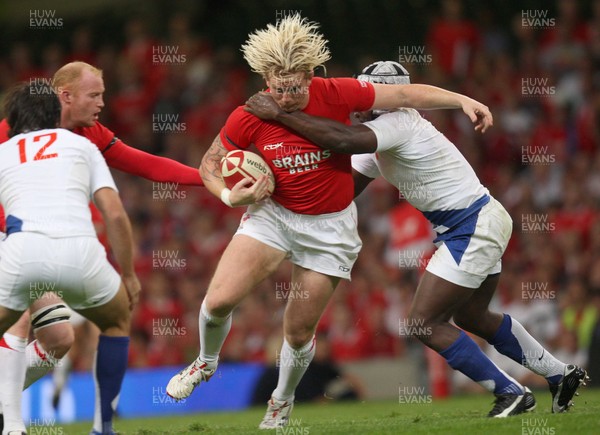 26.08.07 - Wales v France -  Wales' Alix Popham is tackled by France's Serge Betsen 