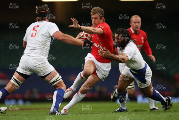 26.08.07 - Wales v France -  Wales' Jamie Robinson takes on France's Jerome Thion and Sebastien Chabal 
